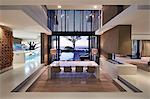 Modern luxury home showcase interior with sunset ocean view