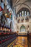 Main altar and choir stalls of the Church of Ireland, Gothic styled, National Cathedral and Collegiate Church of Saint Patrick, Patrick Street, Dublin 8, Ireland.
