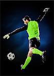 one caucasian goalkeeper soccer man isolated on black background