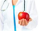 dentist holding a ripe apple good for the gums