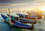 Venice with gondolas on Grand Canal against San Giorgio Maggiore church in Venice, Italy