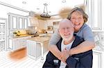 Happy Senior Couple Over Custom Kitchen Design Drawing and Photo Combination.