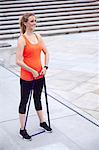 Woman using resistance band