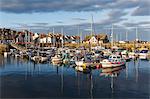 Sailing boats at sunset in the harbour at Anstruther, Fife, East Neuk, Scotland, United Kingdom, Europe