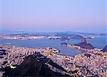 Brazil, State of Rio de Janeiro, City of Rio de Janeiro, Corcovado Mountain, Twilight view of the city with Sugarloaf Mountain and Guanabara Bay.