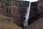 One of the highest waterfalls in Iceland, Hengifoss falls 128m into a gorge near Egilsstadir in the East Fjords region