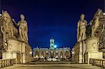 The Capitoline Hill,  Piazza della Campidoglio and the Comune  Di Roma, with the statues of Castor and Pollux at twilight, Rome, Lazio, Italy.