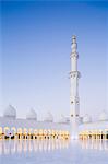 United Arab Emirates, Abu Dhabi. The courtyard and white marble exterior of Sheikh Zayed Grand Mosque. Completed in 2007 the mosque can hold over 40,000 worshippers and is made up of 82 domes and four 107m high minarets.