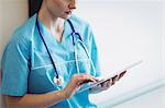 Nurse using digital tablet at the hospital