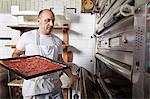 Baker working in bakery