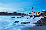 View of Golden Gate Bridge from Marshall's Beach at dusk, San Francisco, California,  USA