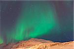 Nothern Lights with Mountains in Tromso, Troms, Norway