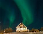 House with Nothern Lights in Sommaroya, Tromso, Troms, Norway