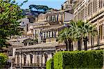 View of Baroque, stone buildings on mountain side in Modica in the Province of Ragusa in Sicily, Italy