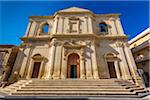 Steps and main entrance of the facade of the Church of the Crucifix (Church of the Holy Cross, Chiesa del SS Crocifissio) in Noto in the Province of Syracuse in Sicily, Italy