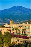 View of Taormina with Mount Etna in the background, Sicily, Italy