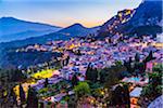 Overview of Taormina at Dusk with Mount Etna in the background, Sicily, Italy