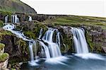Waterfall near Kirkjufell (Church Mountain), just outside the town of Grundarfjordur on the Snaefellsnes Peninsula, Iceland, Polar Regions