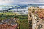 Early morning fog around Curbar village, from Curbar Edge, Peak District National Park, late summer heather, Derbyshire, England, United Kingdom, Europe