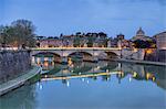 Dusk on Tiber River with Umberto I Bridge and the Basilica di San Pietro in the Vatican in the background, Rome, Lazio, Italy, Europe