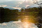 Sunset at Loughrigg Tarn near Ambleside in The Lake District National Park, Cumbria, England, United Kingdom, Europe