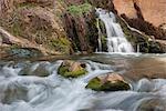 Stream flowing over rocks in Zion National Park, Utah, USA