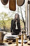 Young woman looking at shop window