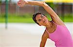 Woman warming up before exercising.