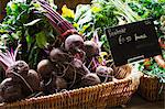 Organic beetroot being sold in a farm shop.