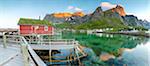 Panoramic of the fishing village surrounded by sea and midnight sun, Reine, Nordland county, Lofoten Islands, Arctic, Northern Norway, Scandinavia, Europe