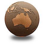 Australia on 3D model of wooden planet Earth with oceans made of cork and wooden continents with embossed countries. 3D illustration isolated on white background with shadow.