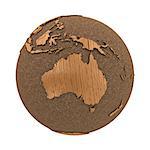 Australia on 3D model of wooden planet Earth with oceans made of cork and wooden continents with embossed countries. 3D illustration isolated on white background.