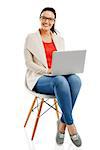 Beautiful and happy woman working with a laptop, isolated over white background