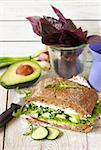 Fresh fitness sandwich with soft cheese and cucumber.