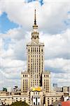Palace Of Culture And Science against the cloudy sky.