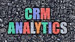 CRM Analytics. Multicolor Inscription on Dark Brick Wall with Doodle Icons. CRM Analytics Concept in Modern Style. Doodle Design Icons. CRM Analytics on Dark Brickwall Background.