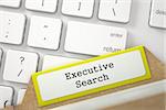 Executive Search. Yellow Index Card Lays on White Modern Computer Keyboard. Business Concept. Close Up View. Selective Focus. 3D Rendering.