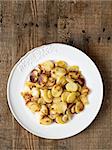 close up of rustic german bratkartofflen fried potatoes