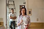 Portrait of a married couple in the middle of renovating their home.