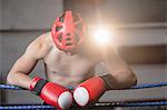 Male boxer in headgear at fitness studio