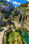 High angle view of cliffs and beach at the coastal town of Gagliano del Capo in Puglia, Italy