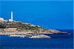 Coastal view with lighthouse at Santa Maria di Leuca in Castrignano del Capo in Puglia, Italy