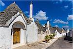 Street with Trulli Houses in Alberobello, Puglia, Italy