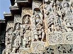 Close-up of carved figures, Hoysaleshvara temple, Halebid, begun in 1121 AD,and uncompleted in 80 years, near Hassan, Karnataka State, India, Asia