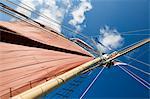 Red sails on sailboat that takes tourists out for sunset cruise, Key West, Florida, United States of America, North America