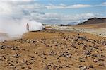 Tourists around the steam jets at Namaskard thermal area, Hverarond, near Lake Myvatn, North area, Iceland, Polar Regions