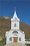 Blue Lutheran church at Seydisfjordur ferry terminal village, North East area, Iceland, Polar Regions