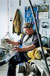 Mature man having break in workshop