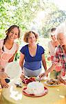 Four women enjoying garden party