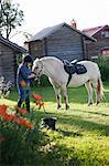 Mature woman with horse